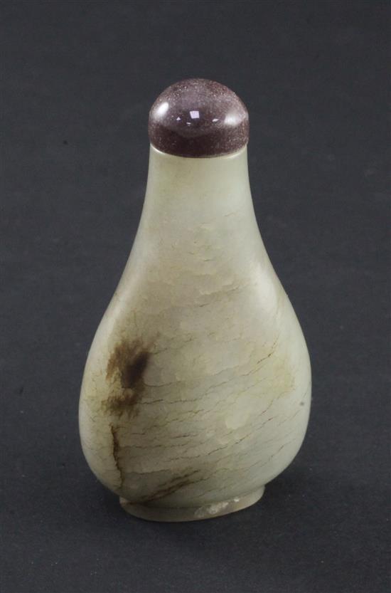 A Chinese celadon and brown jade pear shaped snuff bottle, 1750-1850, 6.1cm